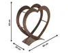 A heart-shaped metal log holder with dimensions indicated. Produktbild-Vorschau