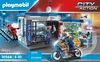 The image shows the packaging of a Playmobil police station playset, featuring police figures, a motorcycle, and a jail cell. Podgląd zdjęcia produktu