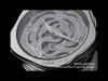 Close-up of a skeleton watch face with intricate detailing. Anteprima dell’immagine prodotto
