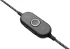 A close-up shot of an in-line remote control for a headset. Anteprima dell’immagine prodotto