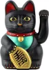 A black Maneki-neko (lucky cat) figurine. Produktbild-Vorschau