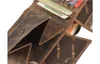 A close-up view of the interior of a brown leather wallet, showing card slots and coin compartments. Produktbild-Vorschau