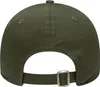 The back view of a green baseball cap with an adjustable strap and metal buckle. Náhled obrázku produktu