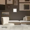 A modern living room with artwork on the wall and furniture. Náhled obrázku produktu
