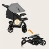 A stroller in its upright position and folded position, with an orange arrow indicating the folding action. Podgląd zdjęcia produktu