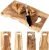 A wooden cutting board with a loaf of bread and a knife on it, with four smaller cutting boards shown below. Anteprima dell’immagine prodotto