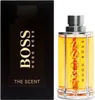 A product shot of Hugo Boss The Scent Eau de Toilette for men, showing both the perfume bottle and its packaging. Náhľad obrázku produktu