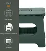 Collage of a dark gray folding stool with text and icons highlighting its features. Produktbild-Vorschau