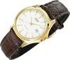 A close-up shot of a gold Casio watch with a white face and a brown leather strap. Anteprima dell’immagine prodotto