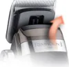 Close-up of a hair clipper, showing the blade attachment mechanism. Podgląd zdjęcia produktu