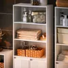 A white shelving unit filled with bathroom accessories. Náhled obrázku produktu
