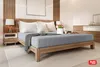 A bedroom scene with a bed, nightstand, and dresser. Produktbild-Vorschau