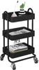 A black three-tiered rolling cart with decorative items on the shelves. Voir les images du produit