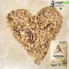 A heart shape made of bird food with dried mealworms, next to a bag of bird food. Produktbild-Vorschau