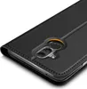 A close-up view of the back of a black smartphone case, showing the camera cutout and stitching detail. Produktbild-Vorschau