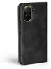 A close-up side view of a black flip phone case with a gold-trimmed camera cutout. Produktbild-Vorschau