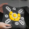 A person is holding a dog puzzle toy under running water. Produktbild-Vorschau