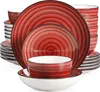 A stack of red and white ceramic plates and bowls with a swirled pattern. Náhled obrázku produktu