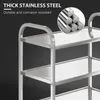 Close-up of a stainless steel kitchen trolley with text overlay highlighting its features. Voir les images du produit