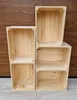 Several wooden crates are stacked against a wooden wall. Náhled obrázku produktu