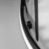 A close-up view of a curved shower door frame and a hinge mechanism. Produktbild-Vorschau