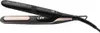 A black and rose gold hair straightener is shown against a white background. Podgląd zdjęcia produktu