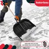 A person is using a snow shovel to clear snow from a paved surface. Produktbild-Vorschau
