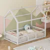 A child's house bed in a room with geometric patterned walls. Anteprima dell’immagine prodotto