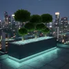 Beleuchteter Glassplitt in einem Pflanzkübel auf der Dachterrasse Produktbild-Vorschau