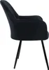 A side view of a black velvet dining chair with black metal legs, isolated on a white background. Náhled obrázku produktu