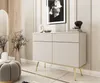 A modern living room with a beige sideboard and decorative items. Voir les images du produit