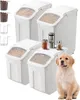A set of white food storage containers with clear lids, some filled with dry food, and a golden retriever puppy sitting in front of them. Voir les images du produit