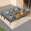 An outdoor patio set with a sectional sofa, armchair, and coffee tables on a rug. Voir les images du produit