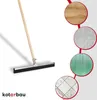 A floor squeegee with a wooden handle is shown against a white background. To the right, there are four circular insets displaying different floor textures: wood, concrete, a green textured surface, and tiled marble. Náhled obrázku produktu