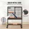 A metal pet cage with multiple levels and ramps, shown indoors. Anteprima dell’immagine prodotto
