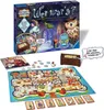 A board game and its components are displayed on a white background, with the game box at the top. Produktbild-Vorschau