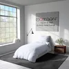 A bedroom scene with a bed, window, and artwork. Produktbild-Vorschau