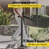 A person is using a black metal handrail on outdoor stairs. Podgląd zdjęcia produktu