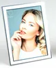 A framed photograph of a woman. Produktbild-Vorschau