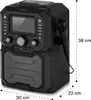 A black karaoke machine with a microphone attached to the side, shown from a three-quarter angle. Produktbild-Vorschau