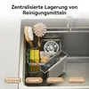 A close-up of a sink organizer filled with cleaning supplies. Produktbild-Vorschau