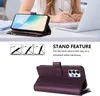 A person is working at a desk with a laptop and a phone case. Produktbild-Vorschau