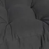 A close-up view of a dark gray tufted cushion. Produktbild-Vorschau
