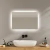 A modern bathroom vanity with a sink and a lighted mirror. Anteprima dell’immagine prodotto