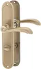 Two bronze-colored door handles with backplates are shown against a white background. Produktbild-Vorschau