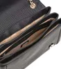 Close-up view of the interior of a black handbag, showing compartments and the Guess logo. Produktbild-Vorschau