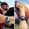 Collage of two lifestyle shots showing a smartwatch on a person's wrist during outdoor activities. Voir les images du produit