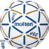 A white handball with blue and gold accents, featuring brand logos and text. Produktbild-Vorschau