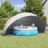 A pool dome set up in a backyard with an inflatable pool inside. Anteprima dell’immagine prodotto