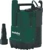 A green submersible pump with a black hose adapter. Náhled obrázku produktu
